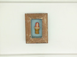 Frame with a handmade girl, decorative element
