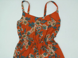 Orange short dress with floral pattern