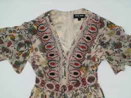 Cream-white short dress with floral pattern Cream-white short dress with floral pattern