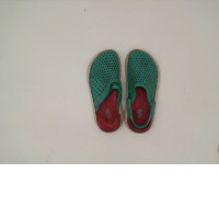 Light green and white closed-toe shoes