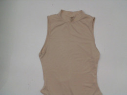 Women's cream-colored round-neck sleeveless shirt