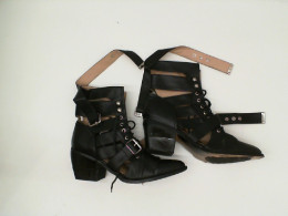 Black braided ankle high heels Black braided ankle high heels