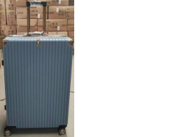 Large purple suitcase