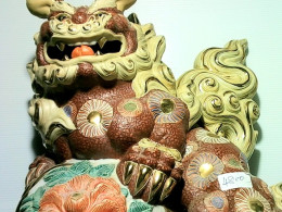 porcelain figurine of a fu dog