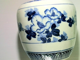 vase with blue ornament vase with blue ornament