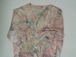 Pink bathrobe with floral pattern