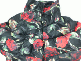 Black sweater with red rose pattern