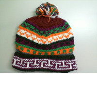 Warm hat with a lush bubo