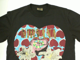 Black oversized round neck t-shirt with heart pattern Black oversized round neck t-shirt with heart pattern