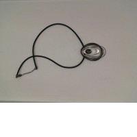 Black necklace with black and silver pendant