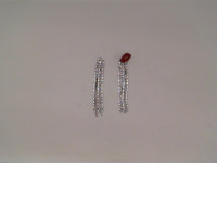 Silver earrings with diamond pattern beads