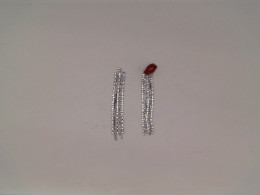 Silver earrings with diamond pattern beads Silver earrings with diamond pattern beads