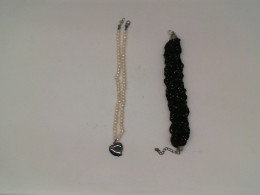 Set of 2 Black and white beaded necklace with heart pendant