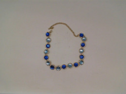 Gold necklace with multi-colored beads