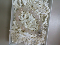 White bead bracelet with elephant pendant