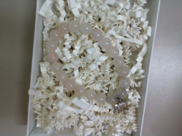 White bead bracelet with elephant pendant