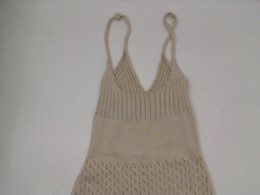 Women's long cream colored tank top