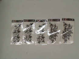 Set of 5 Tattoo of a flower with a butterfly