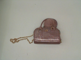 Women's small pink crossbody bag