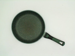 Dark green frying pan