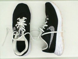 Women's black-white Nike shoes