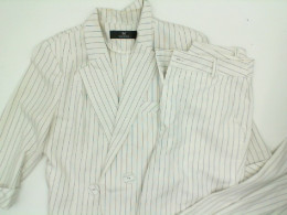 White women's suit: Jacket and trousers White women's suit: Jacket and trousers
