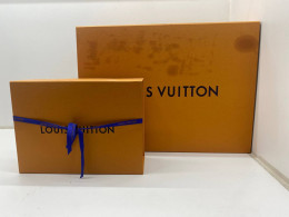 Small and large empty orange boxes 