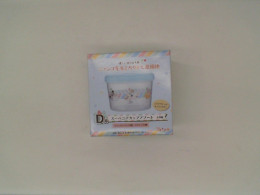 Blue cups and bowls with cartoon designs 