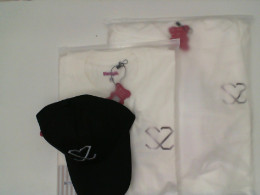 White shirt and black hoodie and hat White shirt and black hoodie and hat