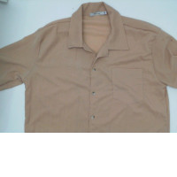 Cream-colored short-sleeved collared shirt