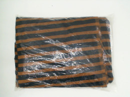 Black towel with brown pattern 