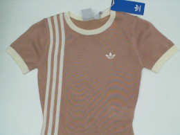 Women's pink sports shirt Size XS Women's pink sports shirt Size XS