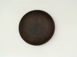 Dark brown ceramic coffee saucer