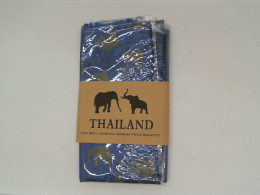 Thai silk with blue elephant pattern 