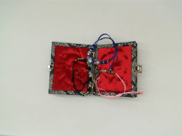 Set of 3 Black, blue and red beaded bracelet in a red box