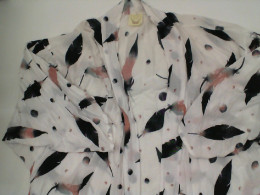 White bathrobe with feather pattern 