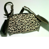 Leather bag with leopard spots