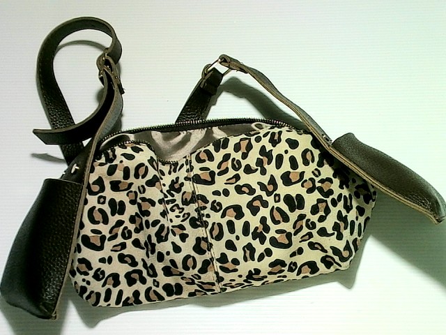 Leather bag with leopard spots Leather bag with leopard spots