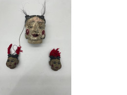 Set of 3 The doll has a human face. 