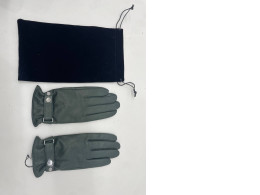 Gray winter gloves and black glove box 