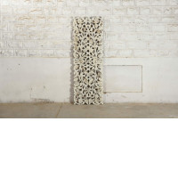 white rectangular wood panels with carvings