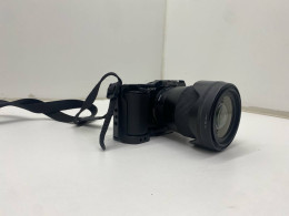 USED Sony ZV-E10 camera with Sigma AF 16mm F1.4 DC DN lens and SmallRig cage installed.