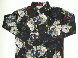 Black long-sleeved shirt with floral pattern Size M Black long-sleeved shirt with floral pattern Size M