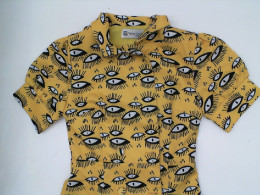 Yellow long dress with eye pattern