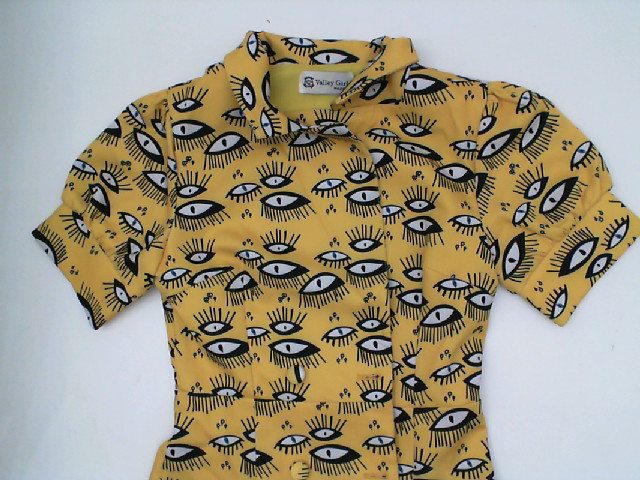 Yellow long dress with eye pattern Yellow long dress with eye pattern