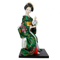 Chinese geisha doll on a stand