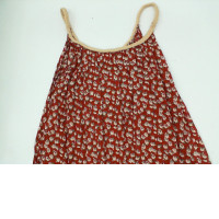 Red one-shoulder maxi dress with white floral pattern 