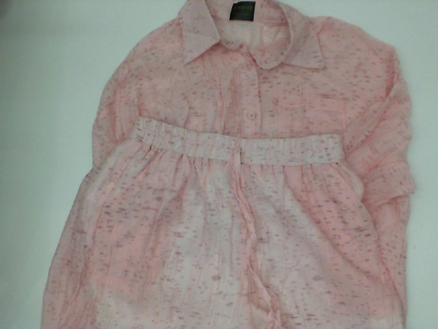 Pink long-sleeved shirt and pink shorts Pink long-sleeved shirt and pink shorts