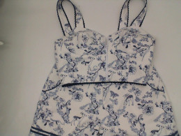 Women's tank top and shorts, white with blue pattern 