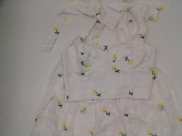 Women's strapless tank top and short skirt, white with yellow-brown pattern 